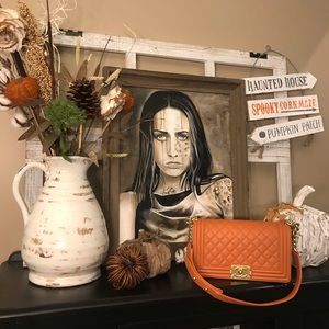 CHANEL Quilted Orange Lambskin Old Medium Boy Flap